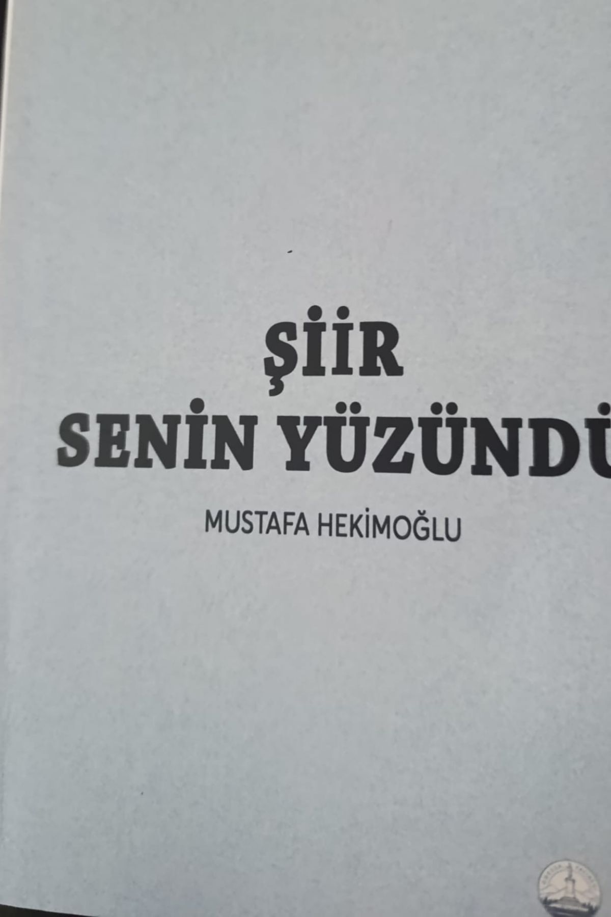 ŞİİR SENİN YÜZÜNDÜ by MUSTAFA HEKİMOĞLU — book cover